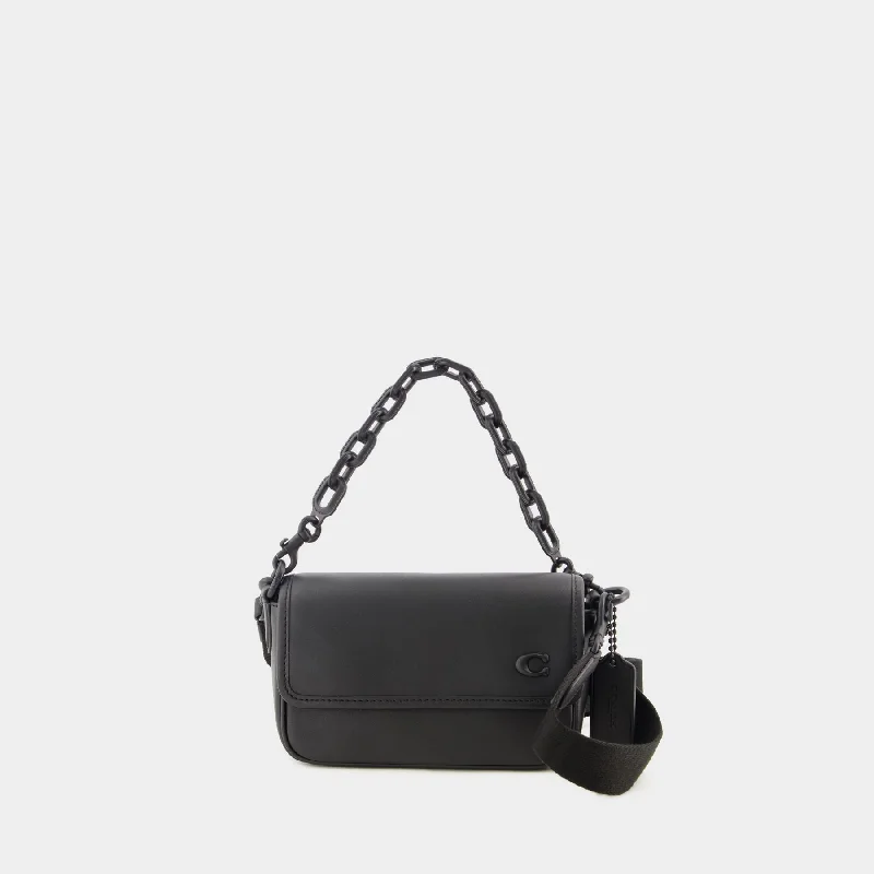 Ladies Coach Tabby bags with a textured leather surface for a more tactile lookCharter Flap 18 Crossbody - Coach - Leather - Black