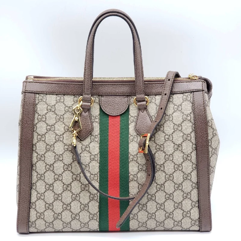 Women Gucci bags with interlocking G hardware for a classic lookGucci GG Ophidia Medium Shoulder Tote Bag