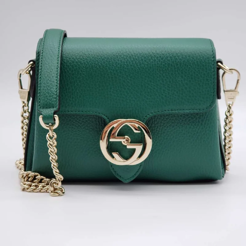 Women Gucci bags with interlocking G hardware for a classic lookGucci GG Interlocking Green Crossbody and Shoulder Bag