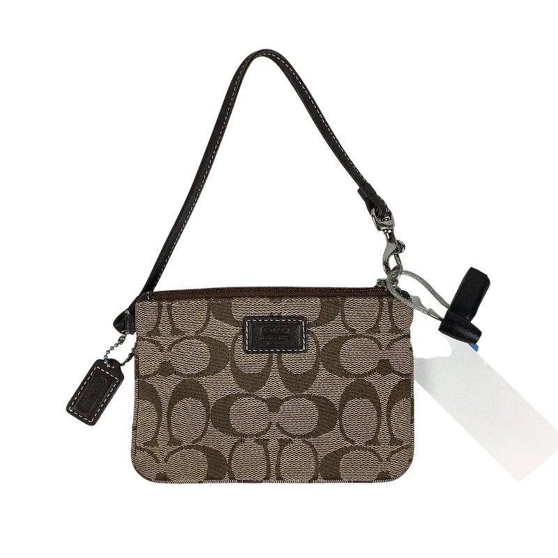 Coach tote bags with a snap - button closure and a decorative charm for styleWristlet By Coach, Size: Small