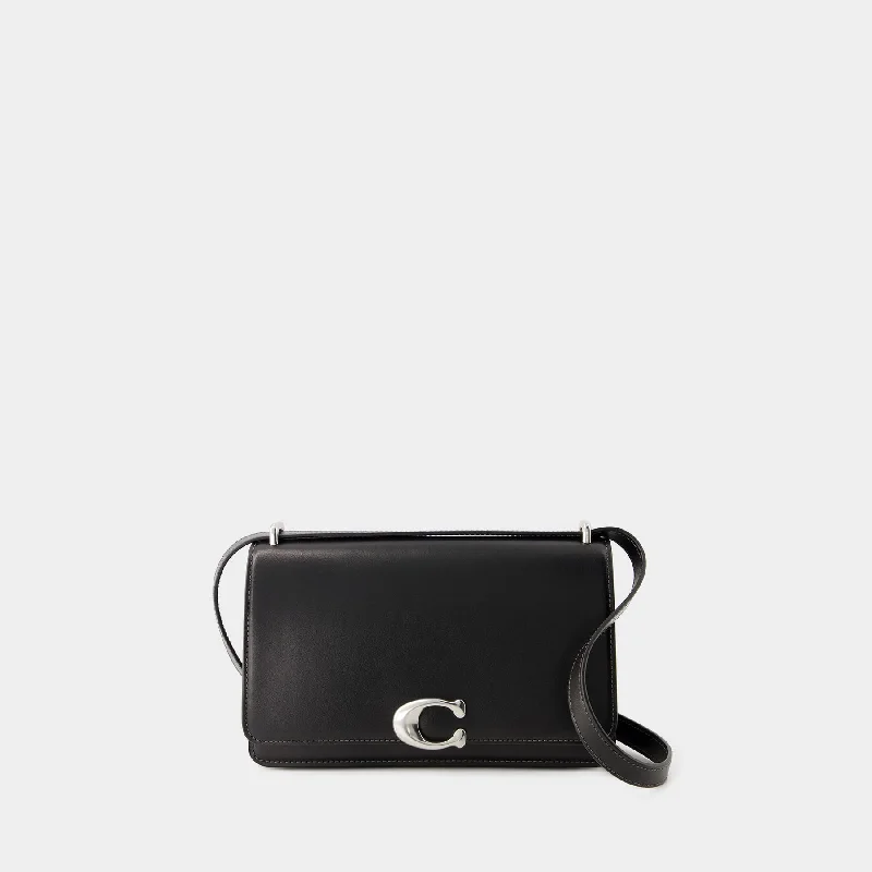 Coach bags with a zip - top closure and a front - pocket for quick accessBandit Bag - Coach - Leather - Black