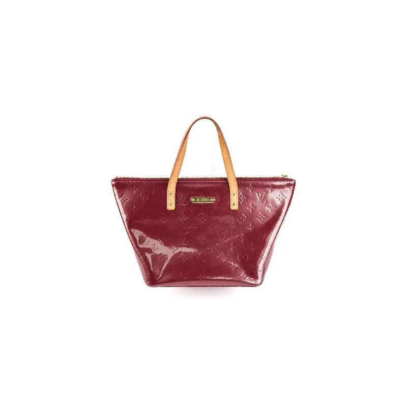 Louis Vuitton Twist bags with a contrast - colored interior for visual interestLouis Vuitton Burgundy Patent PM Tote Bag