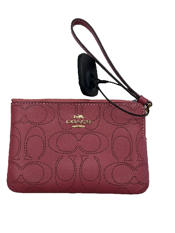 Ladies Coach Tabby bags with a detachable shoulder strapWristlet Designer By Coach, Size: Small