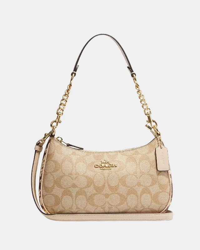 Ladies Coach Tabby bags with gold - toned hardware for a touch of luxuryCoach Teri Shoulder Bag In Signature Canvas Gold/Light Khaki Multi