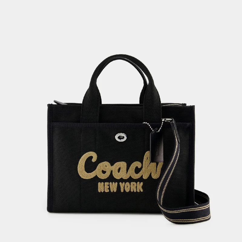 Coach bags with a front - flap pocket and a turnlock for a classic aestheticCargo Tote  - Coach - Canvas - Black