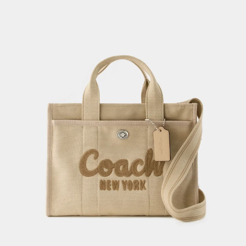 Coach Dempsey bags with a large capacity and a drawstring closureCargo Tote  - Coach - Canvas - White