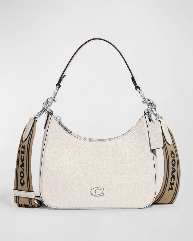 Coach Rogue bags featuring the signature C - hardware for a branded lookZip Leather Crossbody Bag