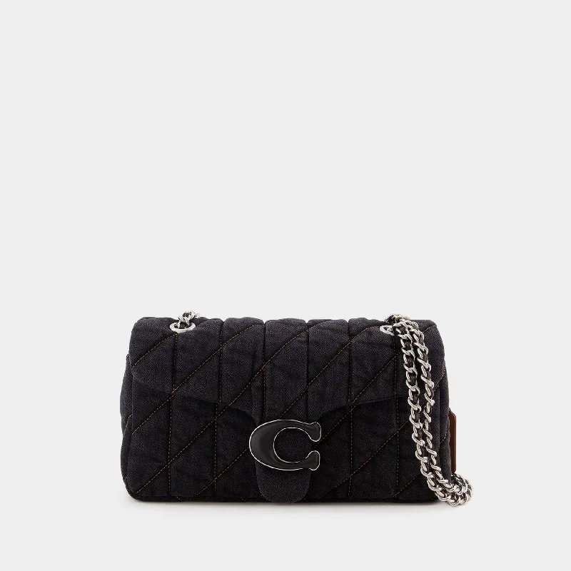 Coach handbags with a perforated leather detail for a breathable and unique designTabby 26 Shoulder Bag - Coach - Cotton - Black