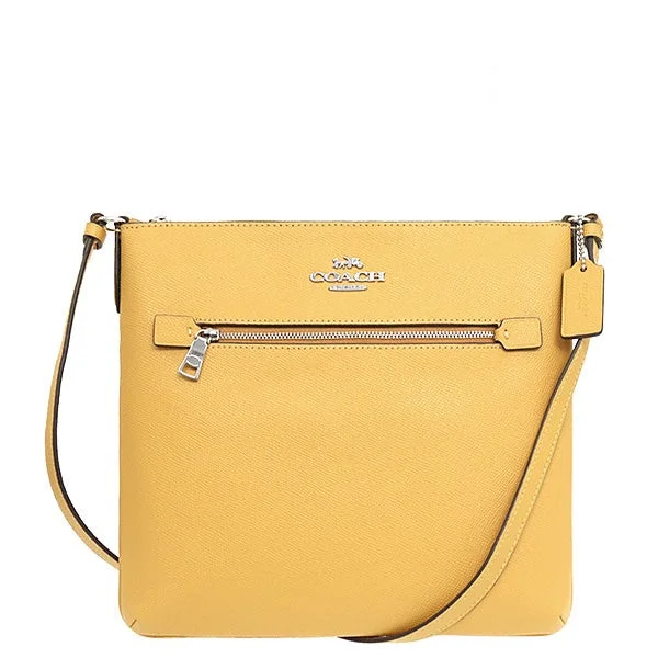 Coach Borough bags with a structured silhouette and a magnetic - snap closureCoach cross grain leather Rowan file bag cf1556