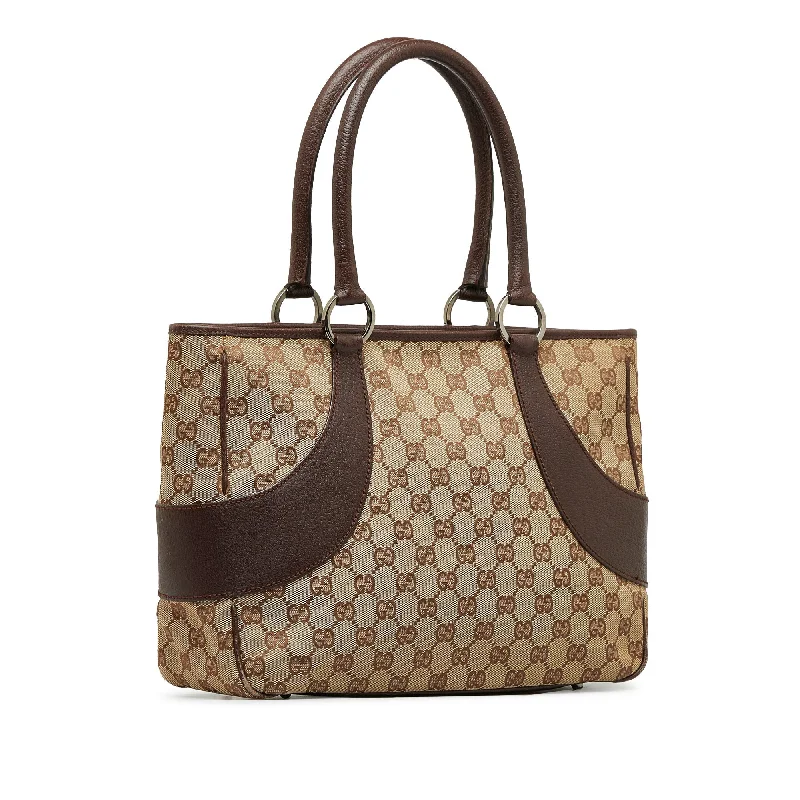 Women Gucci bags with a magnetic snap closure for easy accessBrown Gucci GG Canvas Tote Bag