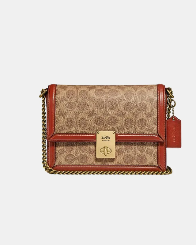 Ladies Coach Tabby bags with gold - toned hardware for a touch of luxuryCoach Hutton Shoulder Bag In Signature Canvas Tan Rust