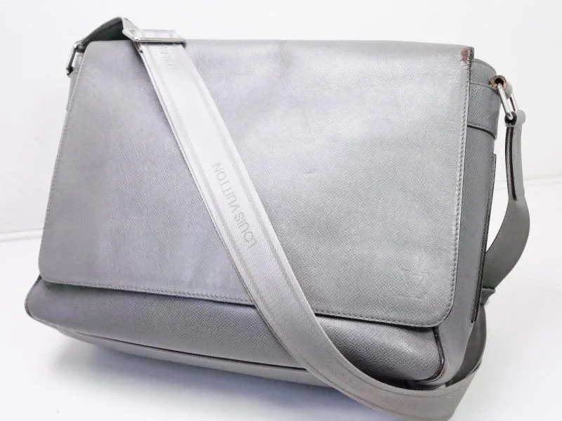 Louis Vuitton Twist bags with the iconic LV - turnlock closureAuthentic Pre-owned Louis Vuitton Taiga Glacier Gray Roman Gm Messenger Cross Body Bag M32626 200216