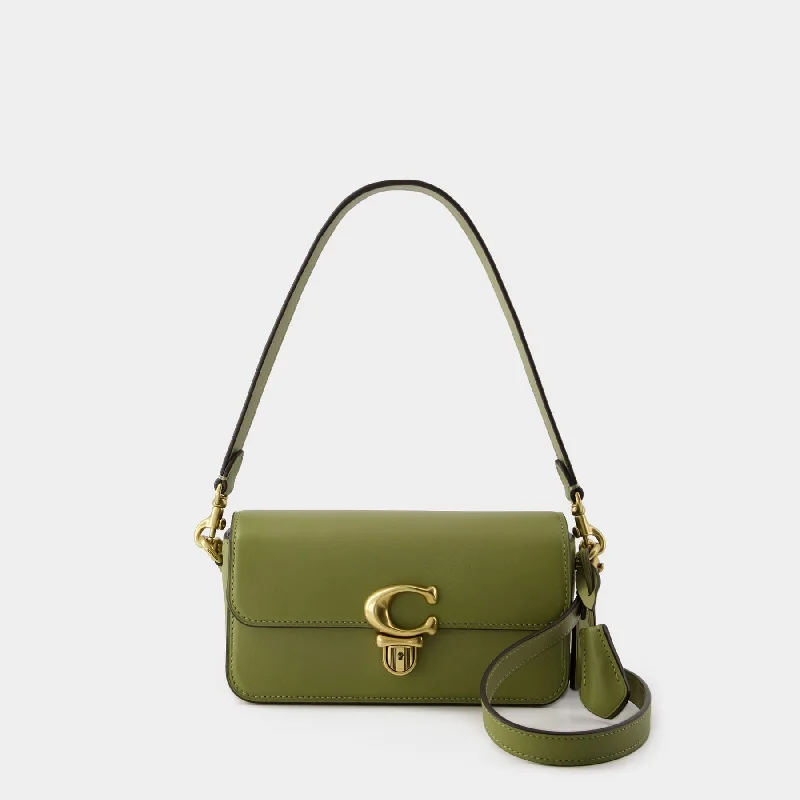 Coach Dempsey bags with a leather - wrapped drawstring for a luxurious feelHobo Studio Baguette - Coach - Leather - Khaki