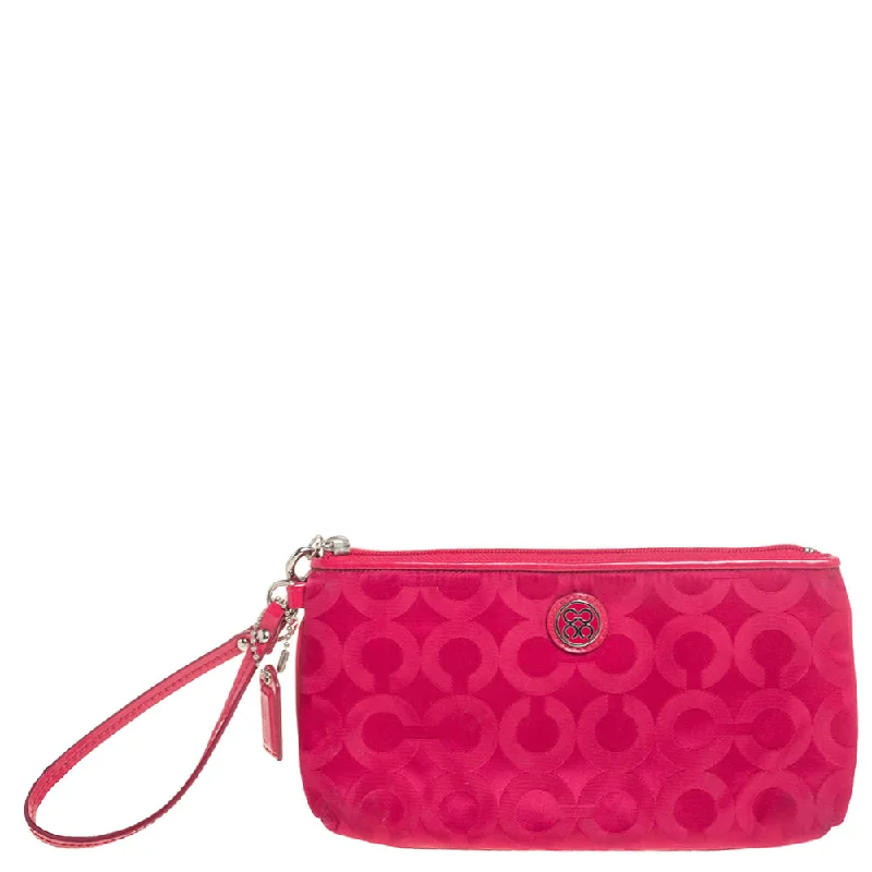 Coach bags with a front - flap pocket and a turnlock for a classic aestheticFuchsia Signature Nylon Wristlet Pochette