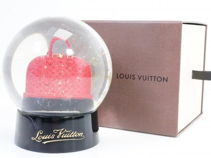 Louis Vuitton Twist bags with a snakeskin - effect panel for a bold lookAuthentic Pre-owned Louis Vuitton Limited Vip Novelty Vernis Red Alma Voyage Motif Snow Globe 191012