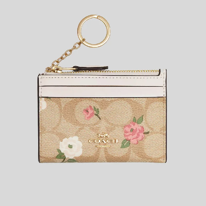 Coach tote bags with a printed Coach logo for brand visibilityCOACH Mini Skinny Id Case In Signature Canvas With Floral Print CR972