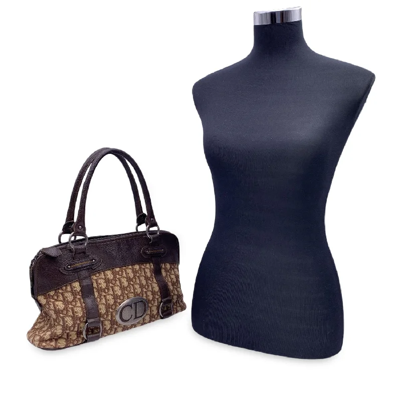 Christian Dior tote bags with a printed Dior logo on the frontCHRISTIAN DIOR Brown Logo Oblique Canvas Satchel Shoulder Bag